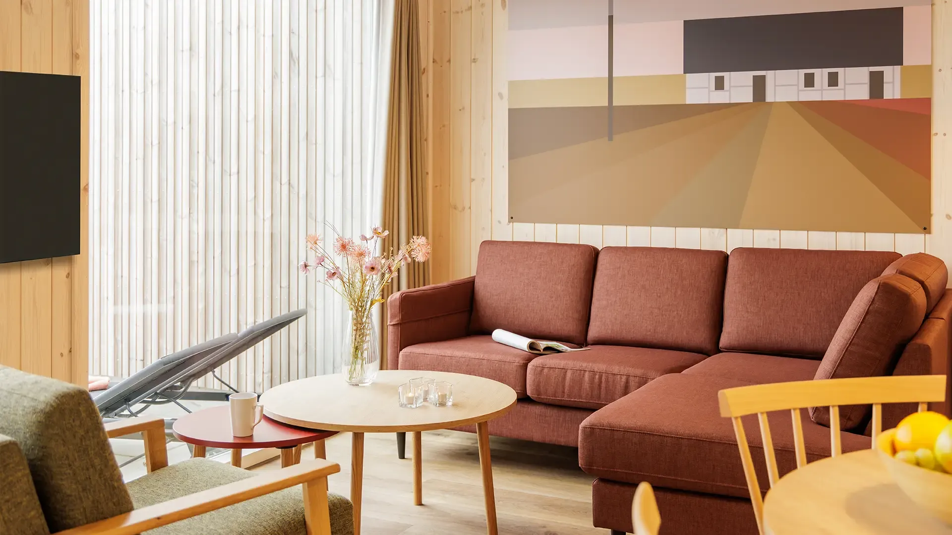 Contract-grade sofa solution designed for long lifecycle performance in resort cottages at Nordborg Resort.