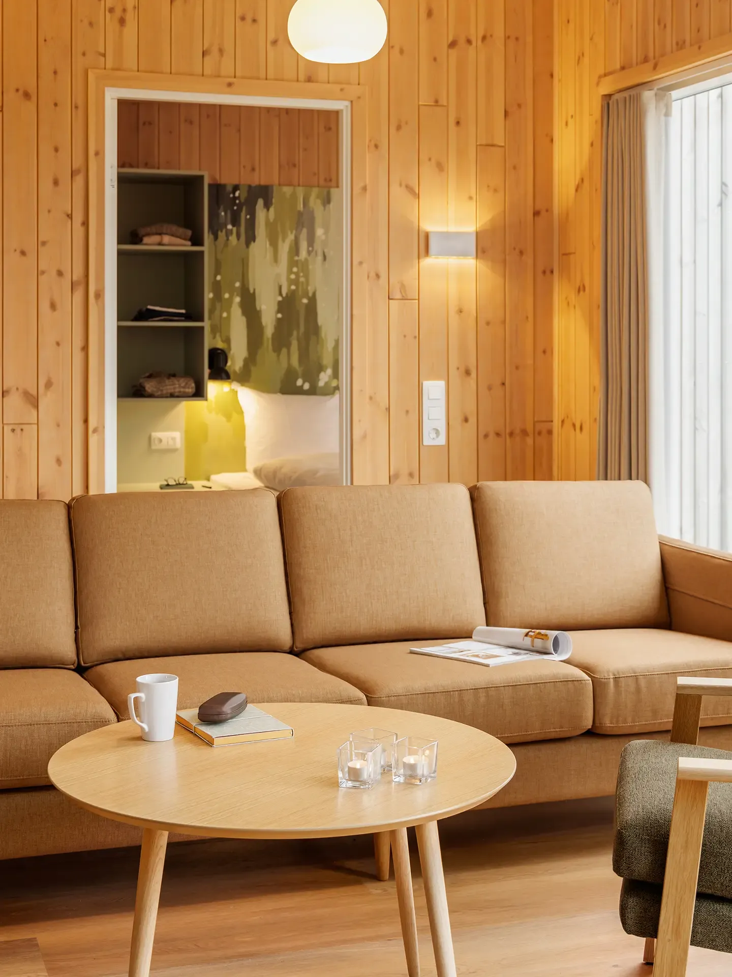 Contract-grade sofa and lounge furniture arranged for long-stay resort accommodation at Nordborg Resort.
