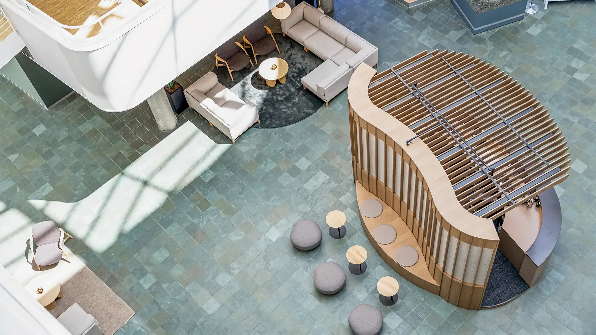 Exclusive custom-made reception counter in office foyer, showcasing bespoke design for contractors and architects.