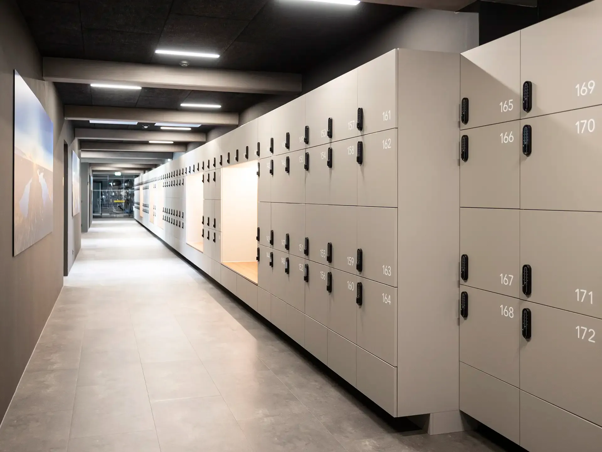 Extended locker wall in Scandinavian style, designed for clinics or fitness centers with a focus on streamlined storage and durability.